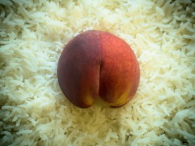 Half a Peach on a Bed of Rice